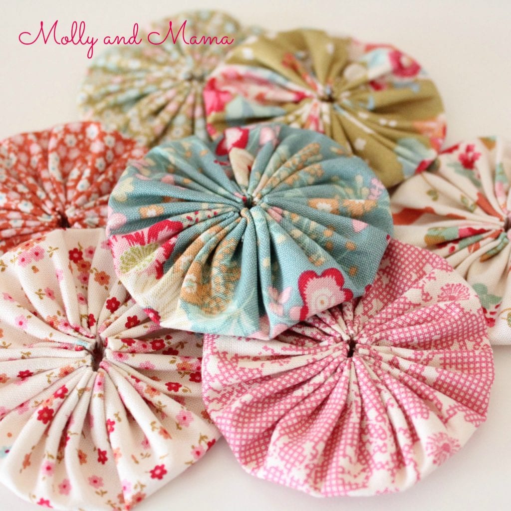 Tilda fabric yoyo's or suffolk puffs by Molly and Mama