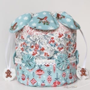 Drawstring dilly bag sewing pattern with fabric petals, pockets and yoyos