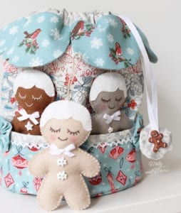 sewing pattern for felt gingerbread ornaments in a Christmas drawstring bag